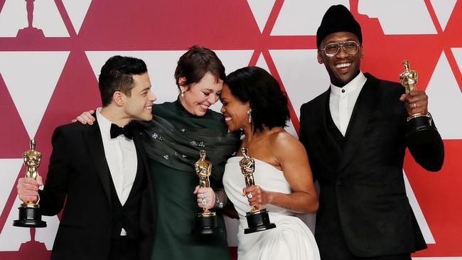 Best Actor Rami Malek, left, Best Actress Olivia Colman, Best Supporting Actress Regina King and Best Supporting Actor Mahershala Ali pose with their Oscars. Picture: Reuters