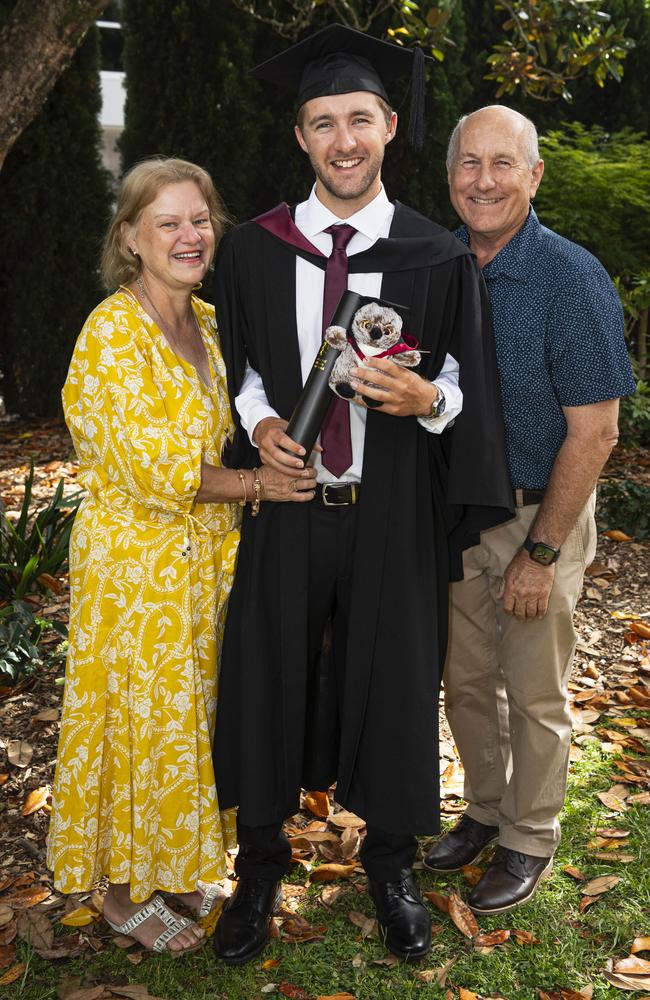 Bachelor of Surveying with First Class Honours graduate Kyran Cook awarded a University Medal is congratulated by parents Gail and Bob Cook at a UniSQ graduation ceremony at The Empire, Wednesday, October 30, 2024. Picture: Kevin Farmer