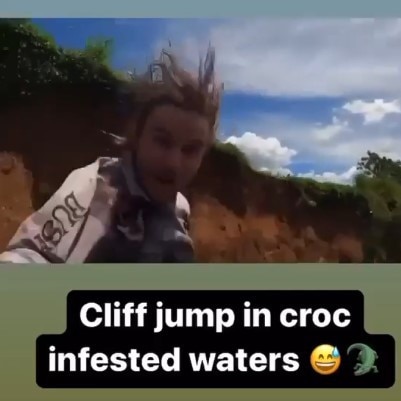 Cassowary Coast Instagrammer Daniel Colombini jumps from a cliff into the Tully River.