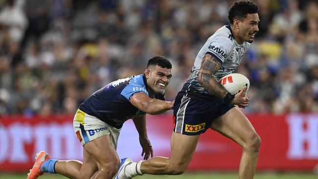 Robert Derby of the Cowboys makes a break during the round eight NRL match between North Queensland Cowboys and Gold Coast Titans at Queensland Country Bank Stadium, on April 26, 2025, in Townsville, Australia. (Photo by Ian Hitchcock/Getty Images)