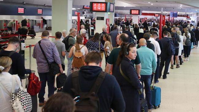 Police are cracking down on anti-social and unruly behaviour at Melbourne airports this festive season. Picture: David Crosling