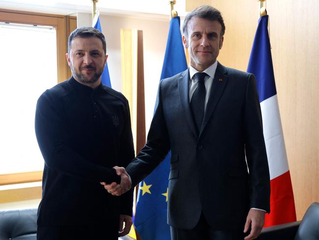 Ukraine's President Volodymyr Zelensky (L) meets France's President Emmanuel Macron on the sidelines of the Special European Council to discuss continued support for Ukraine in Brussels. Picture: AFP