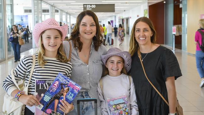 Matilda Hentschke, 11, Rachel Hentschke, Clara Hentschke, 8, and Kristen Carter at Adelaide Airport. Picture: Roy VanDerVegt