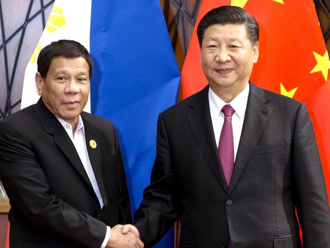 Philippine President Rodrigo Duterte, left, and Chinese President Xi Jinping at the Asia-Pacific Economic Cooperation (APEC) Forum in Danang, Vietnam. Picture: AP