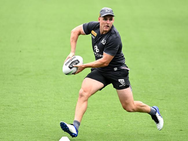 AJ Brimson passes the ball during a Queensland Maroons State of Origin training session at Cbus Super Stadium on October 27, 2020 in Gold Coast, Australia. (Photo by Bradley Kanaris/Getty Images)