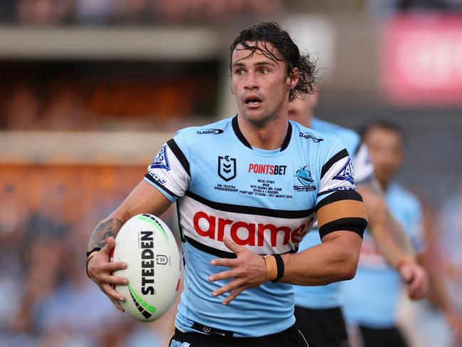 SYDNEY, AUSTRALIA - MARCH 31: Nicho Hynes of the Sharks runs the ball during the round four NRL match between Cronulla Sharks and Canberra Raiders at PointsBet Stadium, on March 31, 2024, in Sydney, Australia. (Photo by Cameron Spencer/Getty Images)