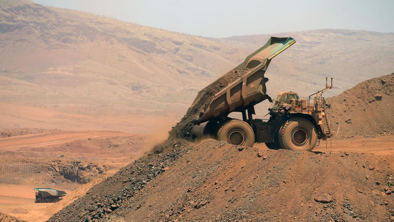 The global iron ore price is expected to soften. Photographer: Carla Gottgens/Bloomberg