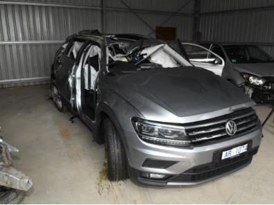 The mangled wreck of the Volkswagen Tiguan wagon driven by Adrian Charles Rawlings.