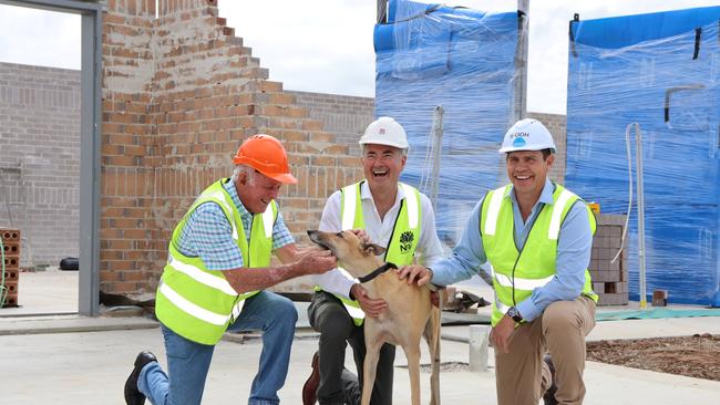 Clarence MP Chris Gulaptis pictured with Grafton Greyhound Racing Club president, John Corrigan (left), Greyhound Racing NSW CEO Tony Mestrov and 'Rusty' the greyhound outside what will be the new state-of-the-art kennels.