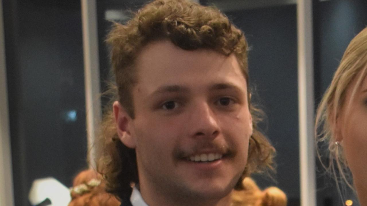 This Andre Agassi-esque mullet sported by Bradley Foster was a definite crowd pleased at the Nambour State College formal. Picture: Eddie Franklin