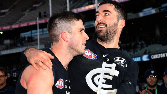 Marc Murphy (left) with Kade Simpson after the veteran’s 300th game.