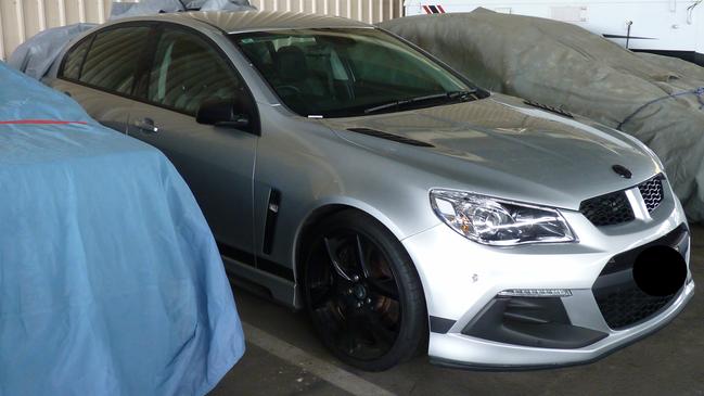 A Holden Commodore located in one of the storage units allegedly linked to Adelaide Hills man accused of dark web drug trafficking and money laundering. Picture: SA Police