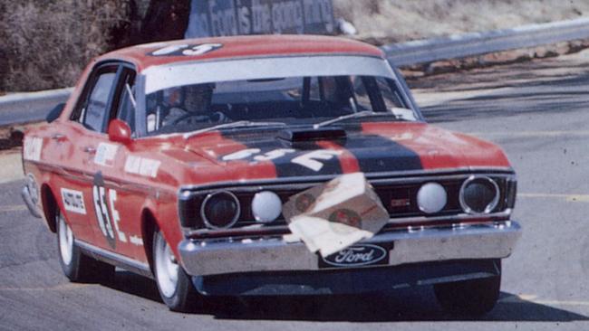 The Falcon GTHO was built to win at Bathurst. Pictured is Allan Moffat driving to victory with cardboard box covering his radiator in 1971. Picture: Supplied