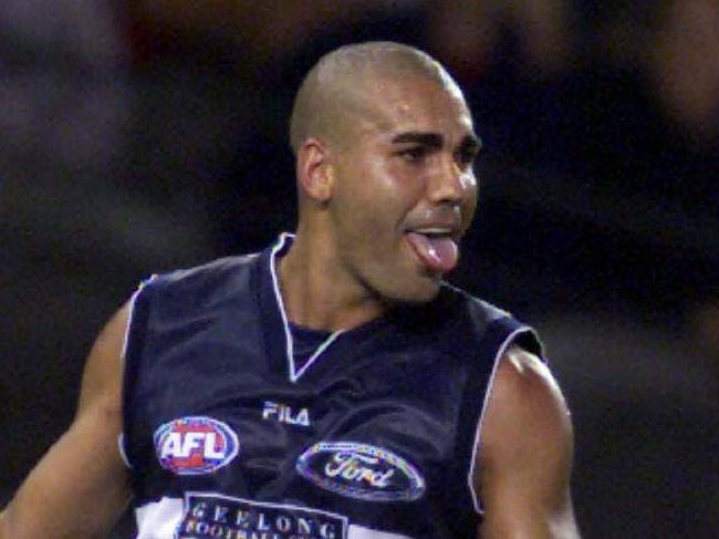 23.2.2001. Justin Murphy (left) and teammate Kent Kingsley.  Geelong v Essendon second-round Ansett Cup match at Colonial Stadium. Justin Murphy enjoys a goal.  football.