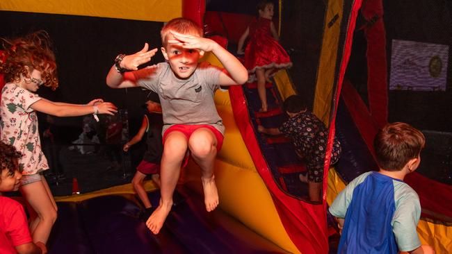 Christopher Bellis had plenty of energy for the bouncing castle. Picture: Pema Tamang Pakhrin