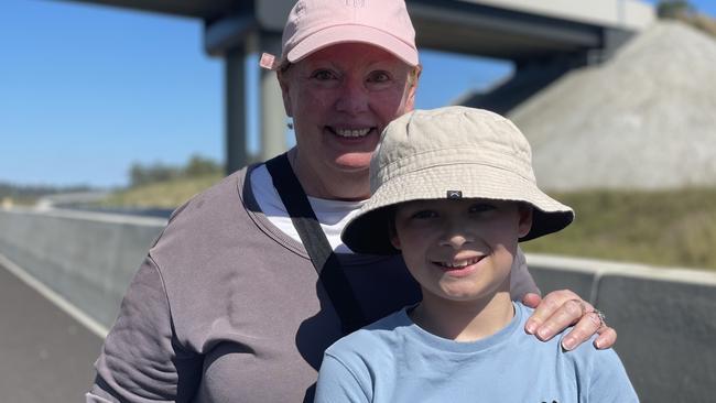 Lis Pyott and Leo celebrate the impending opening of the Gympie Bypass at a community event on Saturday August 17, 2024.