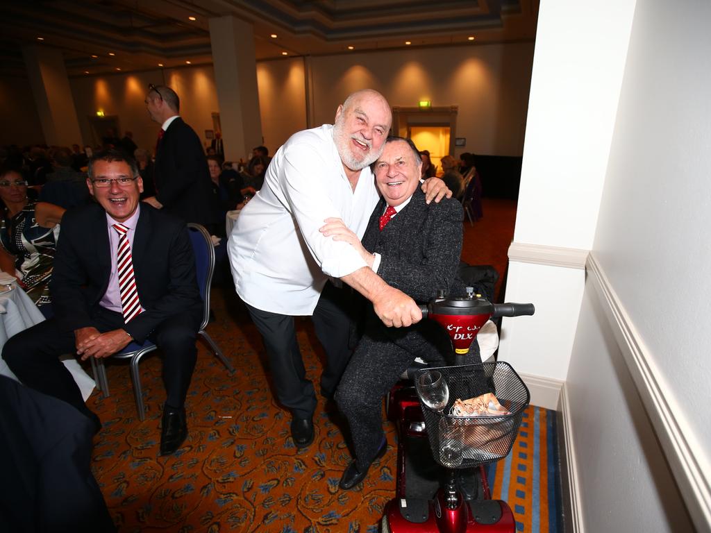 Bob Francis and Barry Humphries at an SA Press Club luncheon event. Humphries sits on Francis’ motorised scooter. Photo Tait Schmaal.