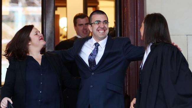 Free: Gangland figure Faruk Orman smiles as her emerges from court a free man. Picture: Aaron Francis/The Australian