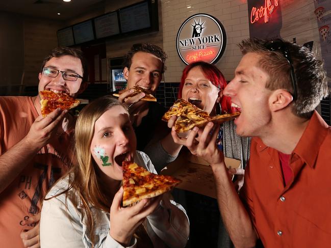 Rodney Owens of Rothwell, Kyra James of Griffin, Daniel James of Griffin, Kathryn Smith of Kallangur and Logan Krup from Chicago outside the new New York Slice. Picture: Josh Woning.