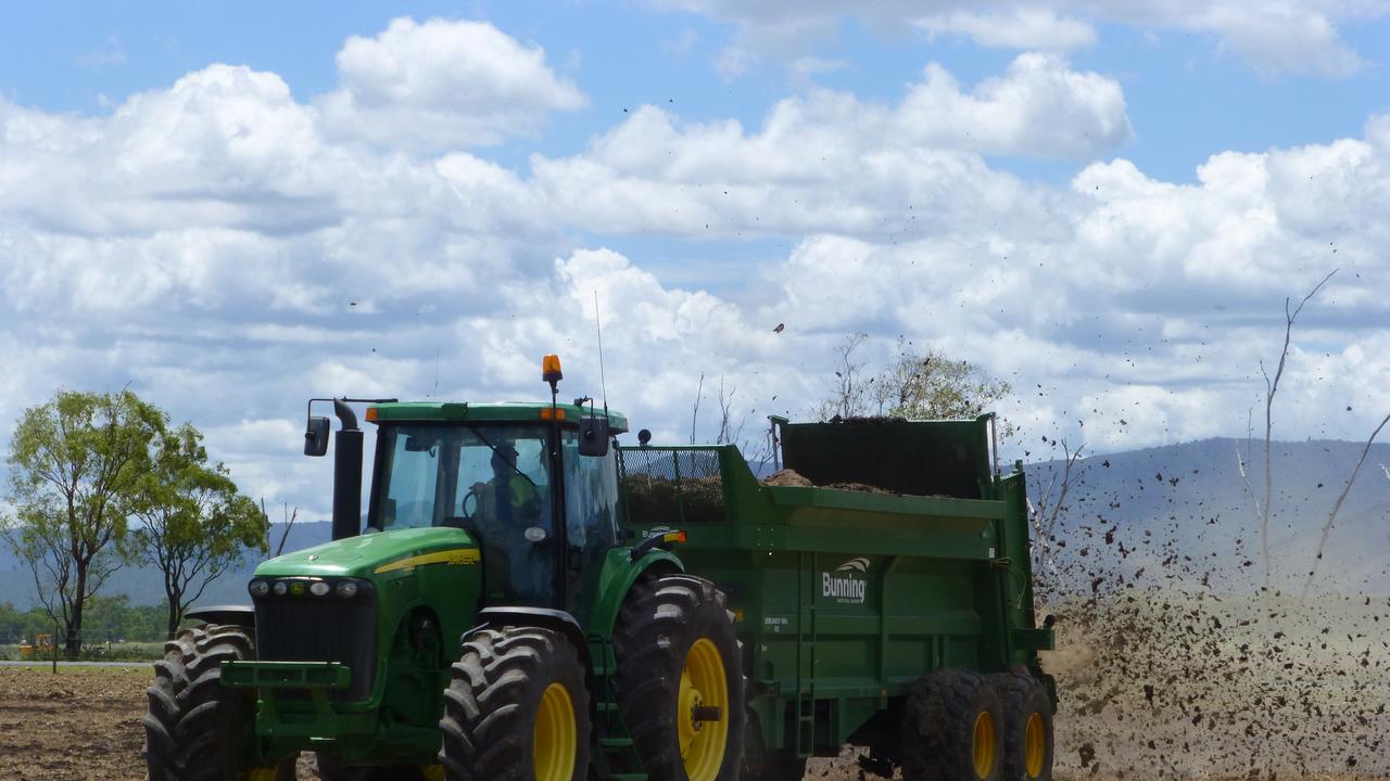 Arkwood Organic Recycling workers spread biosolids on crops for farmers. Contributed