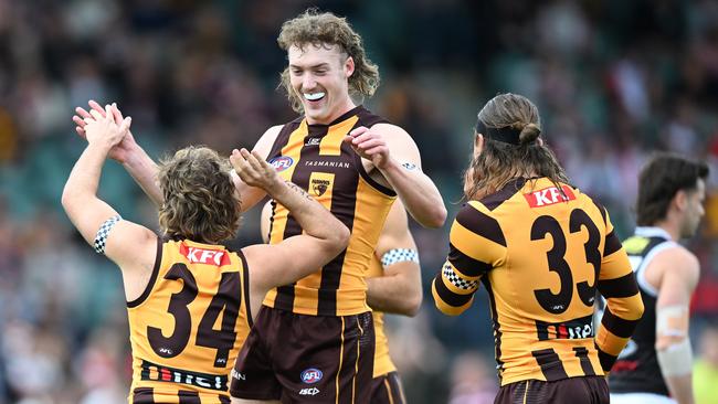 LAUNCESTON, AUSTRALIA - MAY 11: Josh Weddle and Nick Watson of the Hawks celebrate a goal of the Hawks during the round nine AFL match between match between Hawthorn Hawks and St Kilda Saints at  University of Tasmania Stadium, on May 11, 2024, in Launceston, Australia. (Photo by Steve Bell/Getty Images)