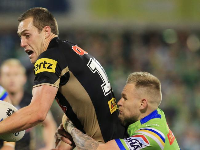 Isaah Yeo of the Panthers brought down by Blake Austin of the Raiders during the Canberra Raiders v Penrith Panthers Elimination Final at GIO Stadium, Canberra. pic Mark Evans