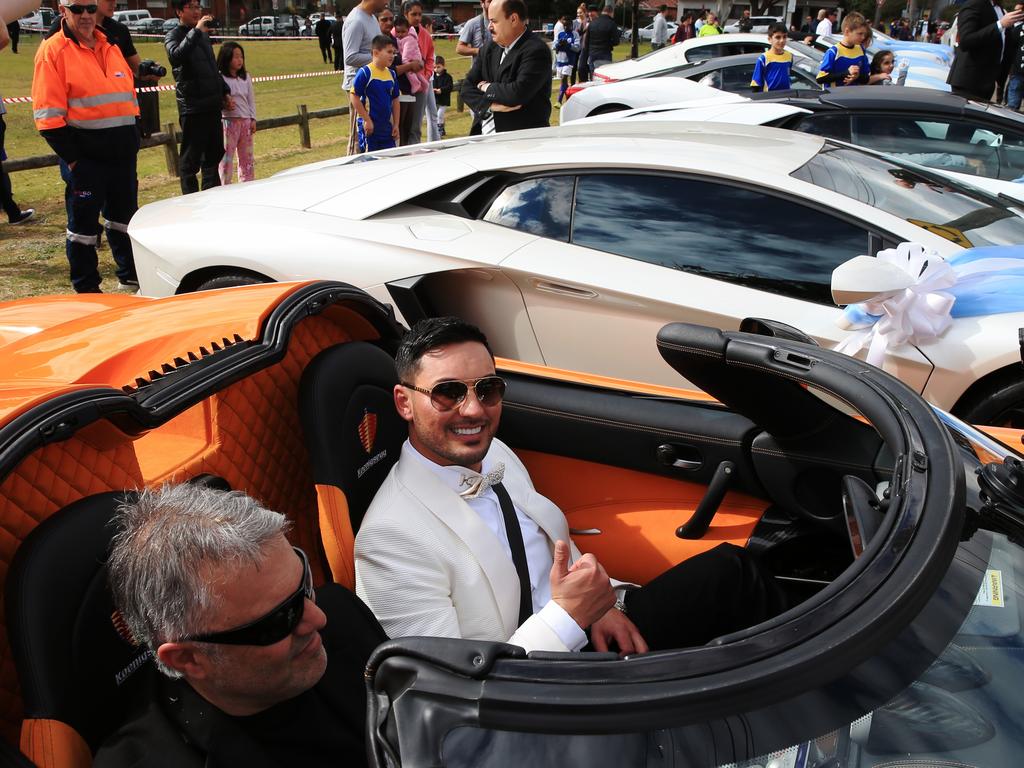 Mehajer poses in the sports car taking him to the wedding ceremony. Picture: Toby Zerna