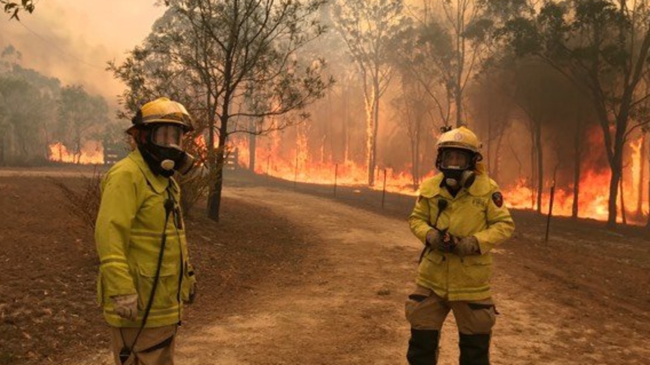 Fire fighters battle a blaze in Central Queensland in December last year.