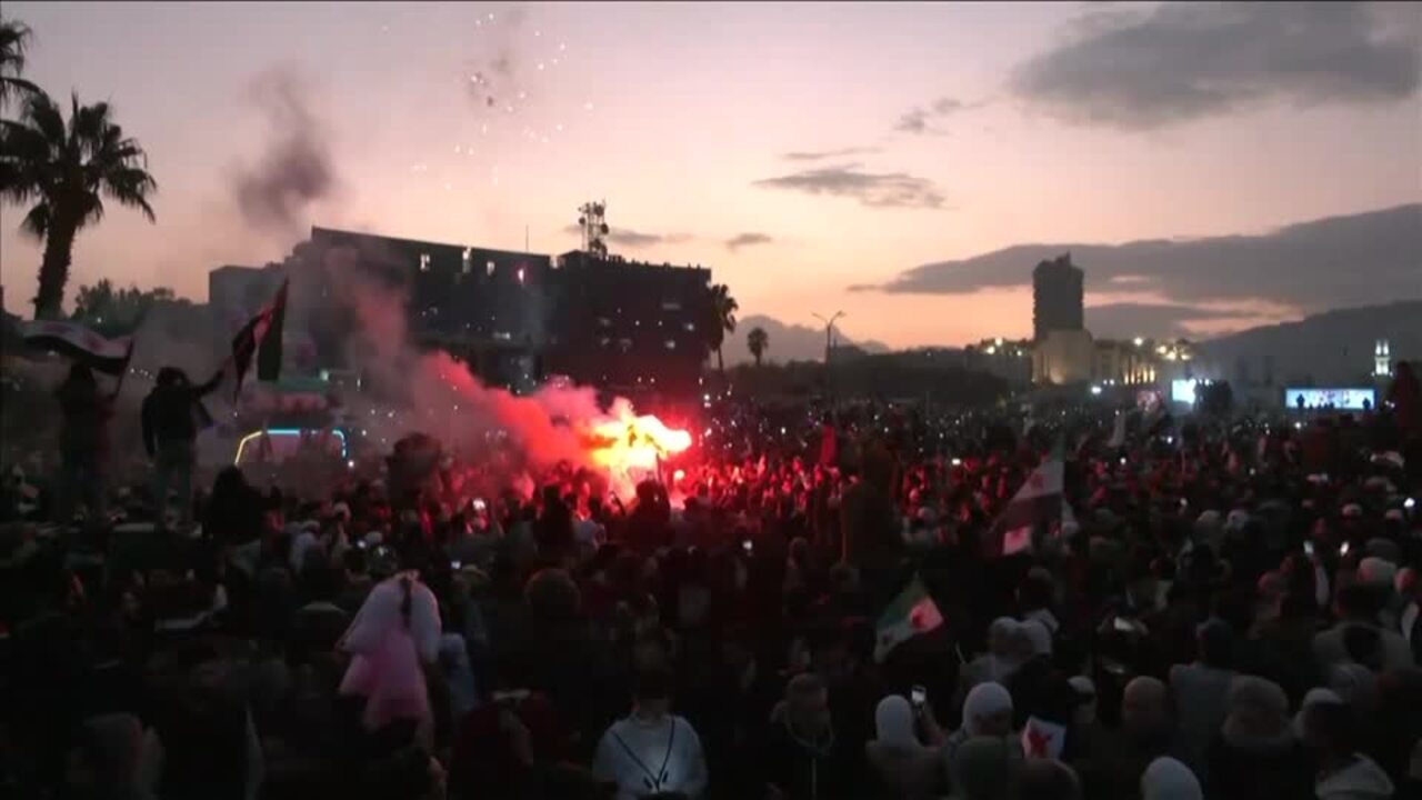 Syrians in Damascus celebrate fall of Assad regime