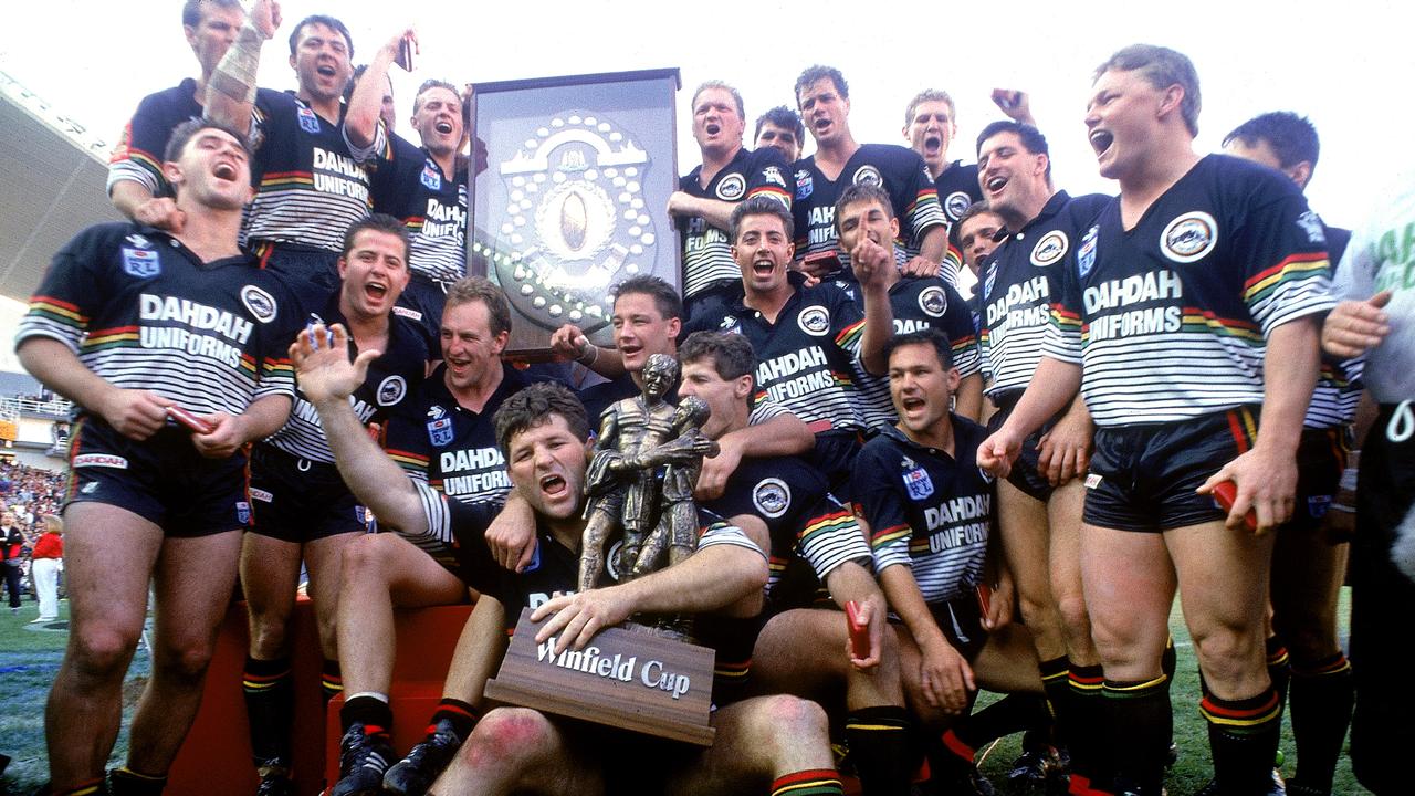 The Panthers celebrate winning the 1991 Grand Final. (Photo by Patrick Riviere/Getty Images)
