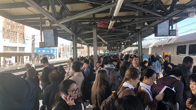 Commuters waiting for trains on the T8-Airport line at Central just after midday. Picture: David Campbell