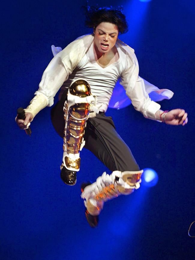 Michael Jackson performs during the Democratic National Committee benefit concert in 2002. Picture: Timothy A. Clary