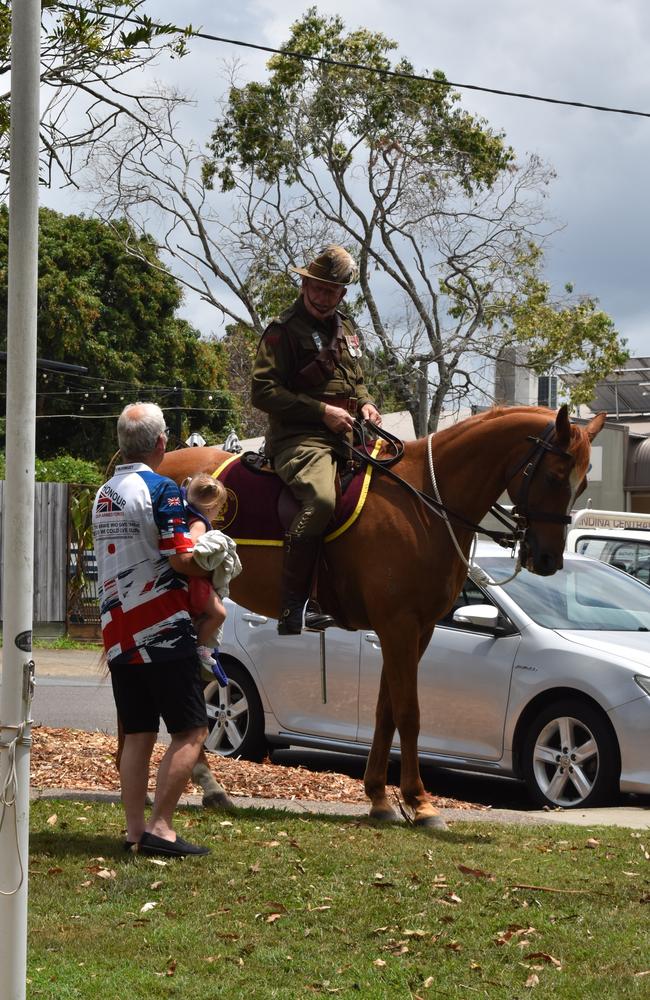 A horse and their rider said hello to a family at Yandina.