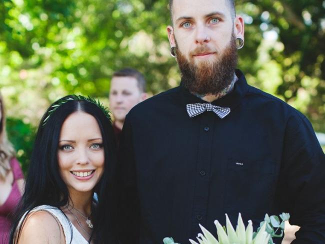 Caity Fitzgerald and her husband Chris on their wedding day. Picture: Tyra Gunnis