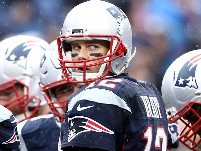 FOXBORO, MA - DECEMBER 24: Tom Brady #12 of the New England Patriots looks on from the huddle during the first half against the New York Jets at Gillette Stadium on December 24, 2016 in Foxboro, Massachusetts. Maddie Meyer/Getty Images/AFP == FOR NEWSPAPERS, INTERNET, TELCOS & TELEVISION USE ONLY ==