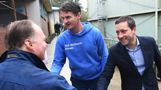 Nick McGowan, centre, with Opposition Leader Matthew Guy. Picture: AAP