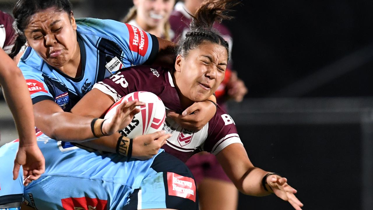 Shannon Mato of the Maroons (right) is tackled by Filomina Hanisi of the Blues during the Women's State of Origin match between Queensland and New South Wales at Sunshine Coast Stadium on November 13, 2020 in Sunshine Coast, Australia. (Photo by Dan Peled/Getty Images)