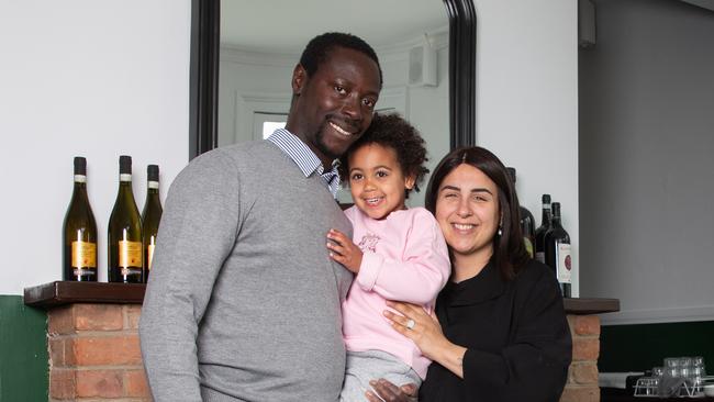 Owners Matteo Diedhiou and Juliana Monachetti with their daughter Valentina, aged 3, at Hampden Bar and Bistro which has opened this week in Battery Point. Picture: Linda Higginson.