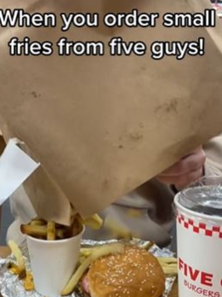 Five Guys often pours an extra scoop of fries in the bag. Picture: TikTok