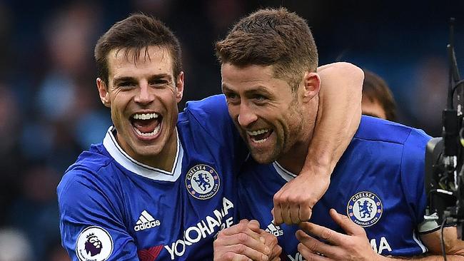 Chelsea's Spanish defender Cesar Azpilicueta (L) and Gary Cahill celebrate.