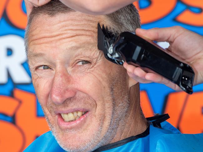 Craig Bellamy and Sandor Earl having their heads shaved for charity.Earl convinced Bellamy to join in a campaign to raise money for the Leukemia Foundation.Earl has his pony tail cut off.Picture Jay Town