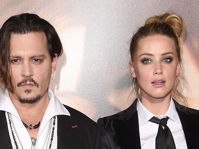 WESTWOOD, CA - NOVEMBER 21: Johnny Depp and Amber Heard attend the premiere of Focus Features' "The Danish Girl" at Westwood Village Theatre on November 21, 2015 in Westwood, California. (Photo by Jason Merritt/Getty Images)