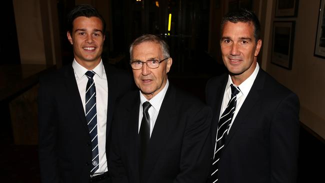 Stephen Silvagni (right) with his son and Blues player, Jack (left) tried to mitigate the drama as he mourned the death of his father Sergio (centre). Picture: Norm Oorloff