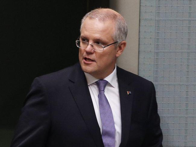 The Treasurer Scott Morrison arrives with Prime Minister Malcolm Turnbull for his second Budget speech in the House of Representatives in Parliament House Canberra. His wife Jenny and two daughters Abbey and Lily were in the chamber for his speech. Picture Gary Ramage