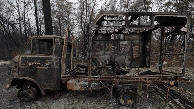 A truck burnt out at Conjola Park, NSW. Photo: Rick Rycroft/AAP