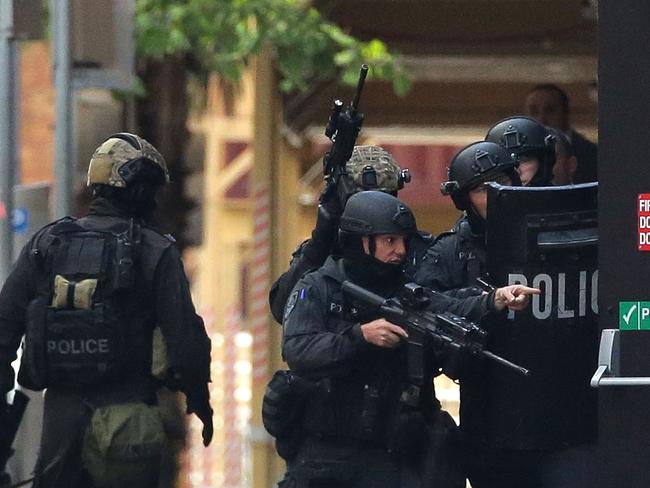 Sydney siege one year anniversary | Lindt cafe, Martin Place | Clover ...