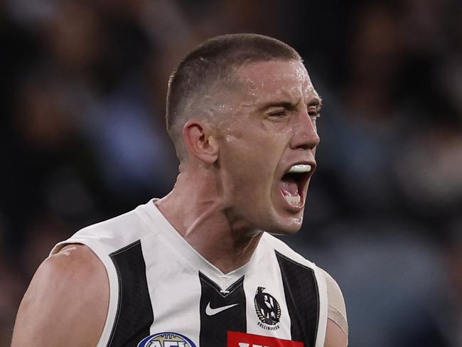 MELBOURNE, AUSTRALIA - AUGUST 23: Darcy Cameron of the Magpies celebrates a goal during the round 24 AFL match between Melbourne Demons and Collingwood Magpies at Melbourne Cricket Ground, on August 23, 2024, in Melbourne, Australia. (Photo by Darrian Traynor/Getty Images)