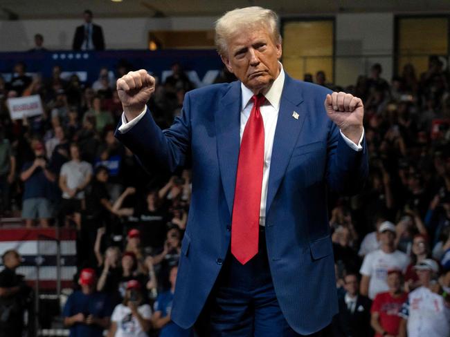 PRESCOTT VALLEY, ARIZONA - OCTOBER 13: U.S. Republican presidential nominee, former President Donald Trump dances during a campaign rally at Findlay Toyota Center on October 13, 2024 in Prescott Valley, Arizona. With leaders of the Border Patrol union in attendance, Trump pledged to hire 10,000 additional border patrol agents if reelected, intensifying his attacks on Democratic opponent Kamala Harris on the issue.   Rebecca Noble/Getty Images/AFP (Photo by Rebecca Noble / GETTY IMAGES NORTH AMERICA / Getty Images via AFP)