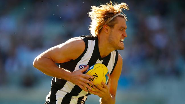 Would moving Darcy Moore free up the cash to land Tom Lynch? Picture: Getty Images