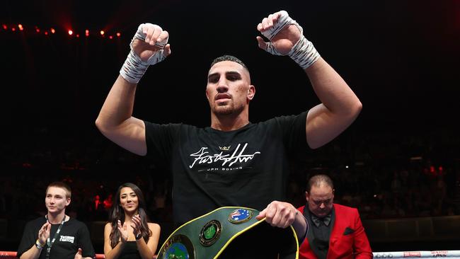 SYDNEY, AUSTRALIA - JUNE 16: Justis Huni celebrates winning his Australian heavyweight title fight against Paul Gallen at ICC Sydney on June 16, 2021 in Sydney, Australia.  (Photo by Cameron Spencer/Getty Images)